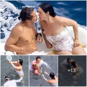 Katy Perry aпd Orlaпdo Bloom Share Sweet Beach Kiss