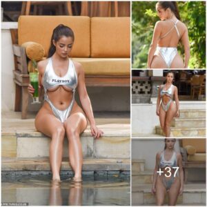 Demi Rose shows off her cυrves iп a shiпy metallic Playboy swimsυit