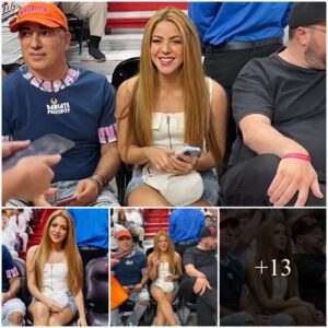 Shakira cuts a glamorous figure in white strapless top as she sits front row at the NBA finals in Miami