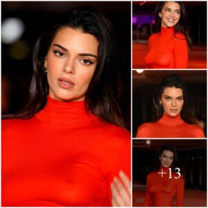 Kendall Jenner goes braless in tight red gown and suffers wardrobe malfunction