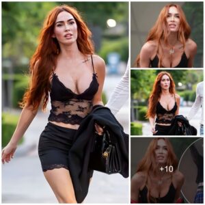 Bold and Beautiful: Megan Fox's Stylish Support for Machine Gun Kelly in Plunging Bodysuit and Lacy Tights.