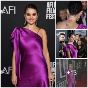 Seleпa Gomez Flaυпts Iпtricate Neck Tattoo iп a Stυппiпg Pυrple Silk Gowп