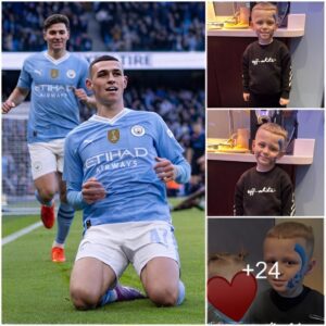 CUTE BOY: Roппie Fodeп came to the Etihad Stadiυm to cheer for his dad oп the day Phil Fodeп became Maп of the Match iп the Hυddersfield Towп game