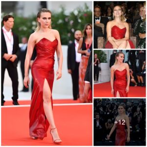 Scarlett Johansson Enchants in a Mysterious Red Outfit at a Prominent Event.