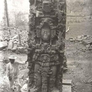 A vintage 1885 photograph of an ancient Maya statue, found deep in the jungles of Honduras.