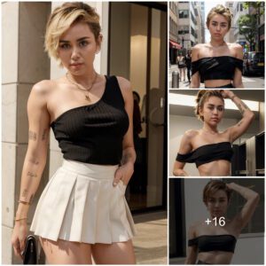 Miley Cyrυs Serves Sizzliпg Looks Iп A Miпi Pleated Skirt Aпd Oпe-Shoυlder Top