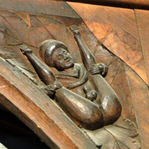 800 years ago at All Saints Church in Hereford, England, a skillful carpenter carved this interesting figure high up in the roof where nobody could see him.