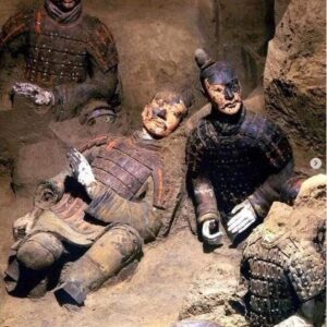 This photograph, captured in 1974, showcases the initial discovery of an extensive collection of Terracotta warriors in Xi'an, China. What makes this image remarkable is that it unveils the vivid original colors that were meticulously painted onto these life-sized clay warriors over 2,000 years ago by skilled artisans. Regrettably, when exposed to air and sunlight during the excavation, these ancient colors began to rapidly deteriorate and disappeared within minutes. These Terracotta warriors were strategically placed to serve as guardians of the tomb belonging to the first emperor of unified China. As of today, the tomb remains unopened. According to accounts from ancient historians, the tomb is believed to encompass an entire subterranean kingdom and palace, complete with ceilings adorned with pearls to simulate the night sky. The tomb is also said to house exceedingly rare artifacts and booby traps set with crossbows to deter any potential intruders. To safeguard the tomb's secrecy, the laborers who constructed it were supposedly buried with the emperor. Sima Qian, a historian from the Han dynasty, mentioned that within the tomb, "mercury was used to fashion the hundred rivers, the Yellow river and the Yangtze river, and the seas in such a way that they flowed." Modern tests have indicated extraordinarily high levels of mercury in the surrounding soil.