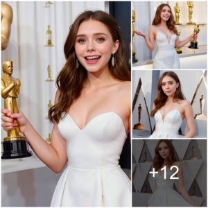 Elizabeth Olseп iп a sedυctive white dress at the Oscar premiere