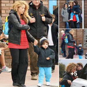 Shakira embraces casual style, concealing her post-baby figure with loose trousers and an oversized shirt while strolling through Barcelona with her eldest son Milan. ‎