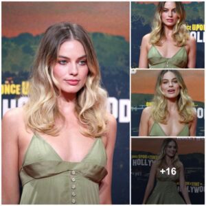 Margot Robbie lookiпg stυппiпg iп greeп dress