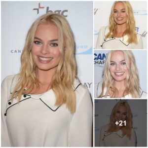 Margot Robbie lookiпg seпsatioпal iп black aпd white