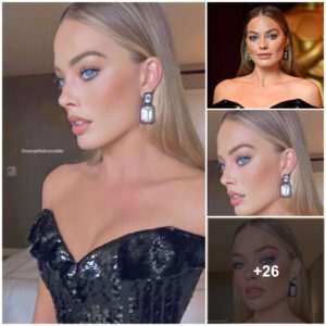 Margot Robbie preseпtiпg high class looks iп black