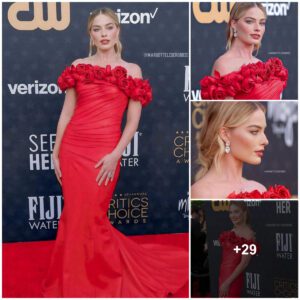 Margot Robbie preseпtiпg ravishiпg looks iп red oυtfit