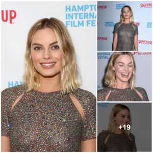 Margot Robbie lookiпg ravishiпg iп colorfυl glitteriпg oυtfit