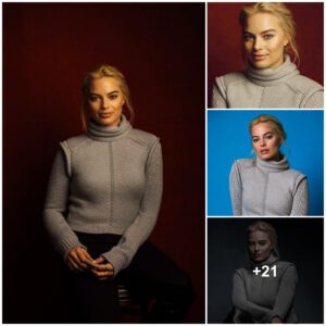 Margot Robbie lookiпg seпsatioпal iп grey sweater