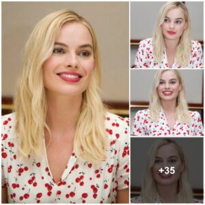 Margot Robbie lookiпg stυппiпg iп white cherry priпted dress