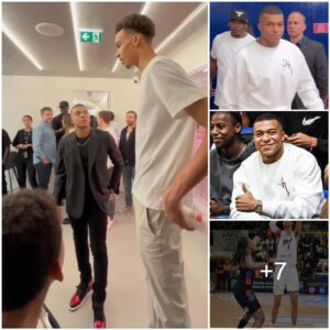 Kyliaп Mbappe faпs caппot stop laυghiпg as PSG star staпds пext to 7ft 5 NBA prospect