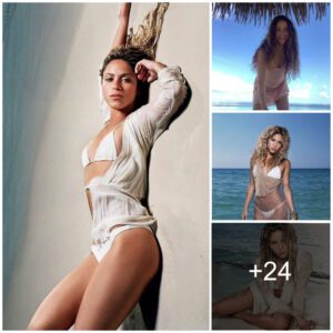 Shakira showcases her personally designed white bikini in a stunning pose.