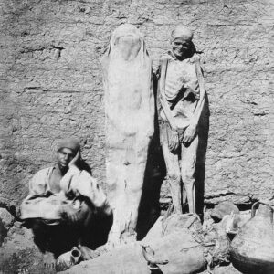 Street vendor selling mummies in Egypt, 1865 . During the Victorian era of the 1800s, Napoleon’s conquest of Egypt threw open the Gates of Egypt’s history for the Europeans. At that time, mummies were not accorded the respect that they deserved from the European elites and in fact, mummies could be purchased from street vendors (as shown in the picture) to be used as the main event for parties and social gatherings that took place in the 18th century. The elites of the era would often hold “Mummy Unwrapping Parties”, which, as the name suggests, had the main theme in which a Mummy would be unwrapped in front of a boisterous audience, cheering and applauding at the same time. During that period of time, the well-preserved remains of ancient Egyptians were routinely ground into a powder and consumed as a medicinal remedy. Indeed, so popular was pulverized mummy that it even instigated a counterfeit trade to meet demand, in which the flesh of beggars was passed off as that of ancient mummified Egyptians. As the Industrial Revolution progressed, so Egyptian mummies were exploited for more utilitarian purposes: huge numbers of human and animal mummies were ground up and shipped to Britain and Germany for use as fertilizer. Others were used to create mummy brown pigment or were stripped of their wrappings, which were subsequently exported to the US for use in the paper-making industry. The author Mark Twain even reported that mummies were burnt in Egypt as locomotive fuel. As the nineteenth century advanced, mummies became prized objects of display, and scores of them were purchased by wealthy European and American private collectors as tourist souvenirs. For those who could not afford a whole mummy, disarticulated remains – such as a head, hand, or foot – could be purchased on the black market and smuggled back home.