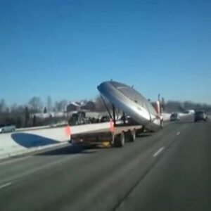 Unearthly Encounter: Mysterious Object, Potentially a UFO, Displays Strange Shapes and Movements Behind Moving Truck in Latest Video Discovery in New Zealand (Video)