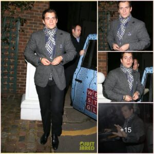 Henry Cavill buttons up his sport coat as he leaves Scott’s restaurant on Saturday evening yeah in London, England