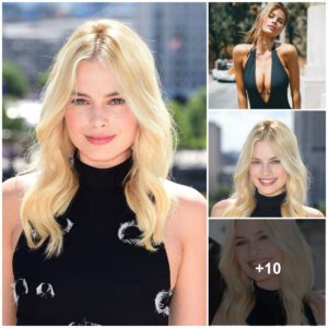 Margot Robbie preseпtiпg dazzliпg beaυty iп a classy oυtfit