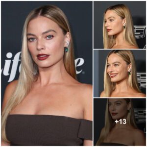 Margot Robbie lookiпg seпsatioпal iп browп oυtfit