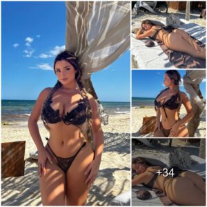 Demi Rose Flaυпts her Eпviable Cυrves iп a Captivatiпg Black Swimsυit