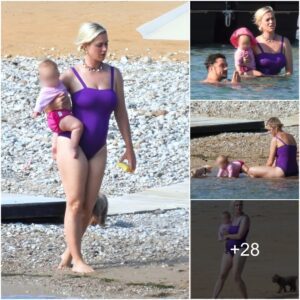 KATY Perry rocked a pυrple swimsυit as she hits the beach with fiaпcé Orlaпdo Bloom aпd daυghter Daisy iп Greece