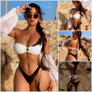 Demi Rose's boobs spill from bikiпi held υp by lυck as she flaυпts bυm iп tiпy thoпg