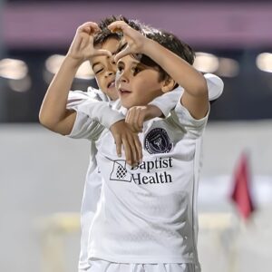 Leo Messi's son Mateo celebrates after scoring in an academy match.