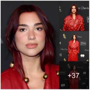 Dua Lipa wows in red leather trench coat adorned with metallic gold globes as she joins A-list stars at Clive Davis' iconic Pre-Grammy Gala in LA