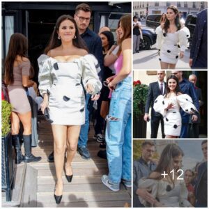 Selena Gomez stuns in a off-the-shoulder polka dot mini dress as she steps out during Paris Fashion Week