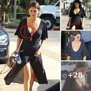 Braless Selena Gomez dares to bare in dress slit to waist