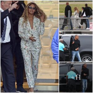 Beyonce flashes cleavage as she walks barefoot in floral print suit for private flight out of the Hamptons with Jay Z