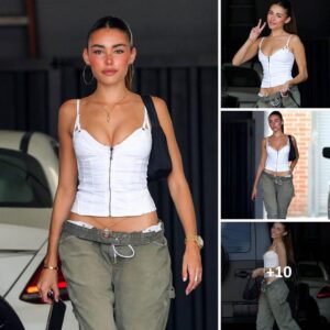 Madison Beer looks trendy in a white corset top and baggy jeans as she leaves a studio in west hollywood