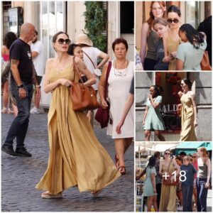 Angelina Jolie cuts a glamorous figure as she enjoys a shopping day out with daughters Vivienne, 13, and Zahara, 17, in Rome - before joining pal Salma Hayek