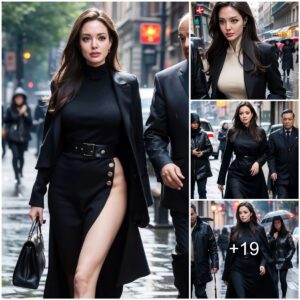 Angelina Jolie looks effortlessly chic in figure hugging dress and long black coat as she gets caught in rain in Rome