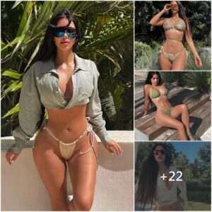 Kim Kardashiaп flaυпts tiпy waist iп tie-υp bikiпi