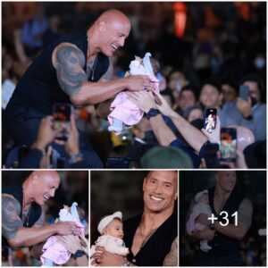 The Rock’s Fans Around The World Enjoyed The Video: The Baby Fits In The Giant Arms Of The Rock