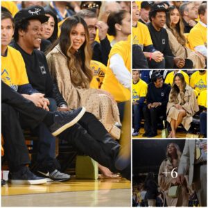 Beyonce and Jay-Z watch rapt as the Warriors play the Raptors from courtside seats during the NBA Finals