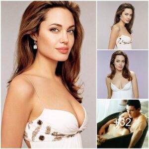 Radiant Angelina Jolie Shines in Regal Style: Spotlight on a Stunning White Gown in a Glamorous Studio Setting