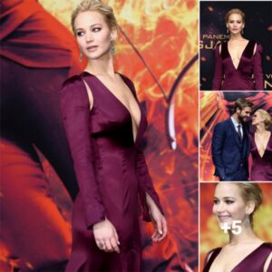 Flame on! Jennifer Lawrence stuns in a daring purple dress at the Hunger Games: Mockingjay