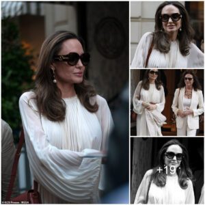 Angelina Jolie exudes glamour in a flowing white dress as she enjoys a day out in Paris with screen legend Jacqueline Bisset