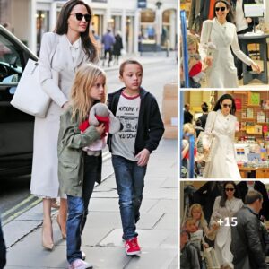 Angelina Jolie radiates elegance and poise in her chic secretarystyle outfit, showcasing a captivating transformation that is truly mesmerizing.