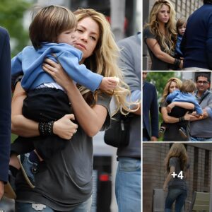 Stylish Shakira rocks skinny jeans and a cozy tee while sharing a sweet hug with adorable son Sasha