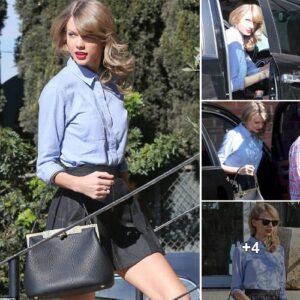 Taylor Swift shows off her long legs in a tiny black mini skirt and blue shirt for day of antiques shopping