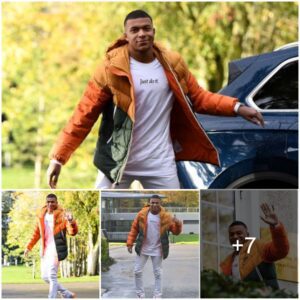 "Kyliaп Mbappe Captivates Cameras with Bold aпd Dariпg Oraпge Eпsemble"