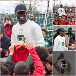 Former Liverpool star Sadio Mane smiles when inspires children at Bourges Foot 18 with heartwarming encounter